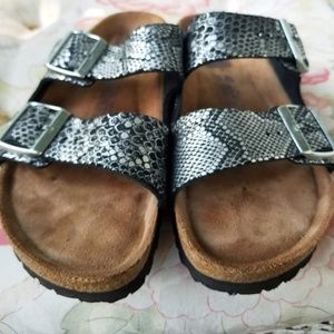 Birkenstock Size 40 solid foot black and silver animal print